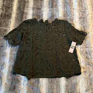 Lace Blouse. Ribbon tie back closure. Attached spaghetti strap, slip tank.